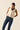 Top lino volantes crema