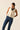 Top lino volantes crema