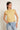 Top lino sin mangas cuello volante amarillo