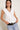 Top volantes escote pico blanco