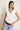 Top volantes escote pico blanco