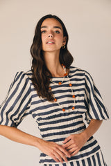 Top riscas azul com manga abalonada