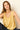 Top lino flecos amarillo