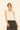 Top lino flecos blanco
