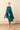 Vestido con capa de gasa y abertura azul petróleo