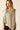 Capa de punto beige lurex