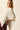 Capa de punto beige lurex
