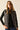 Chaleco reversible animal print negro