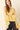Top lino flecos amarillo