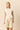 Top blanco con nudo lateral
