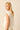 Top blanco con nudo lateral